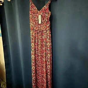 NWT Long floral dress with snap on chest..silky materiall